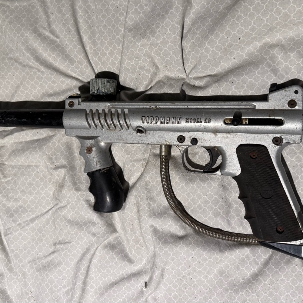 Silver and Black Paintball Marker